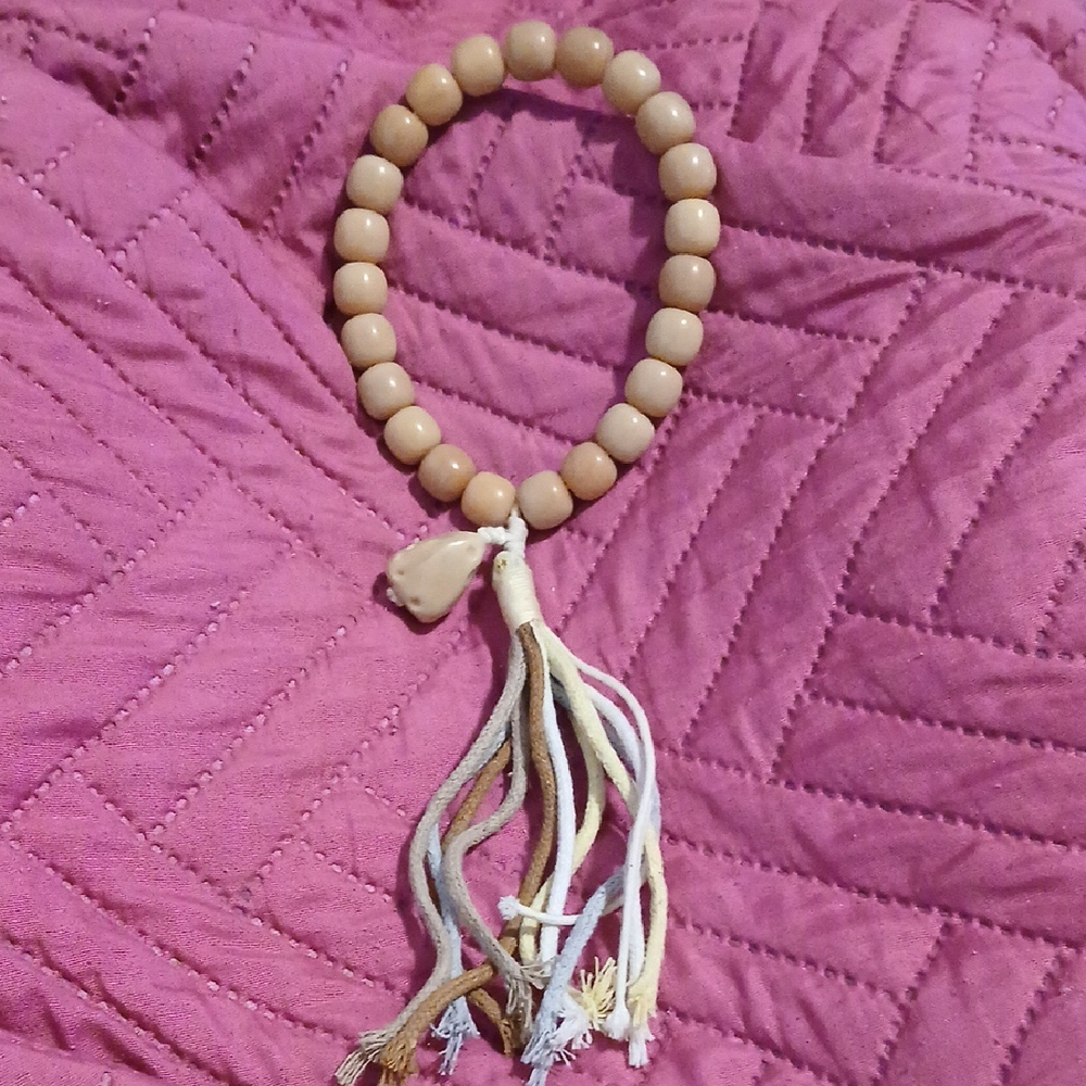 Elegant Tan Beaded Bracelet with Tassel